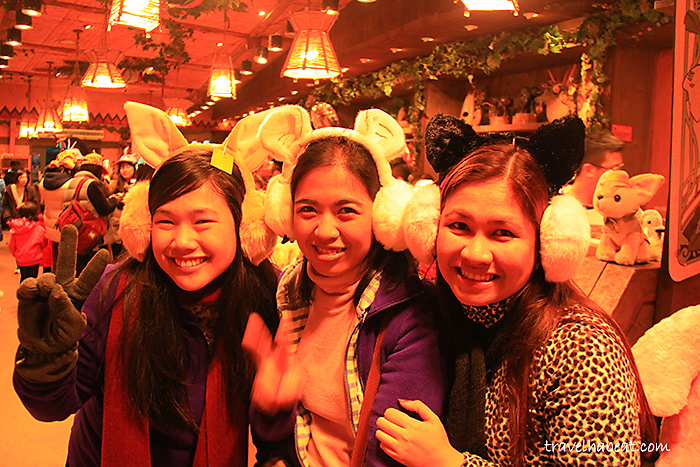 Photo-op with cute animal headdress at the souvenir shop.