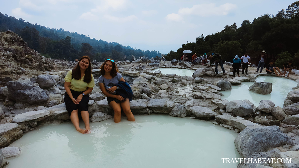 Soaking our feet in a mini volcanic pool.