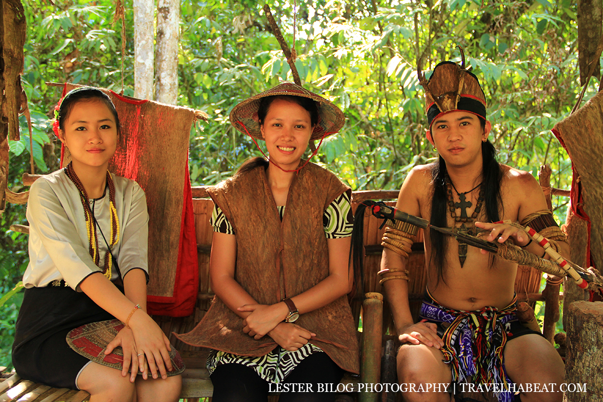 Wearing native vest.