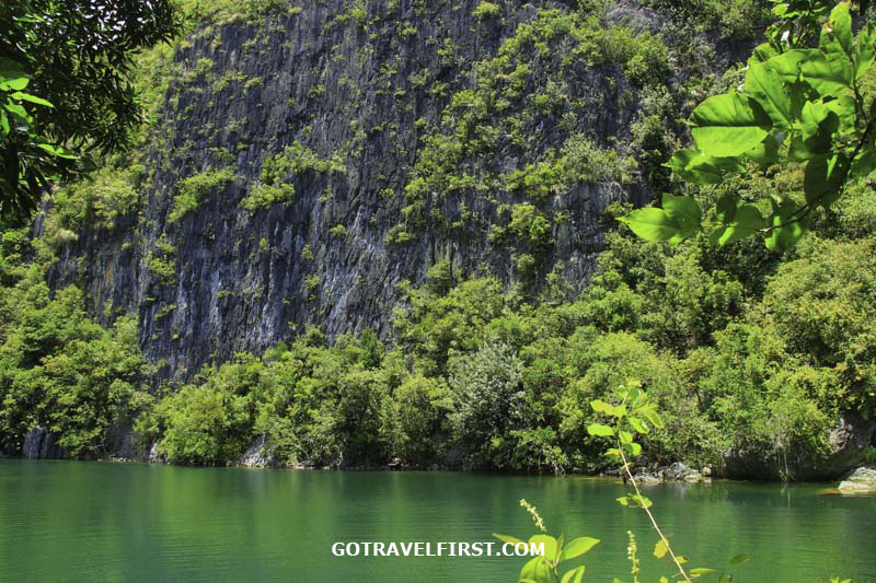 Tayak Lagoon at Malarad Island surrounded buy limestone rocks